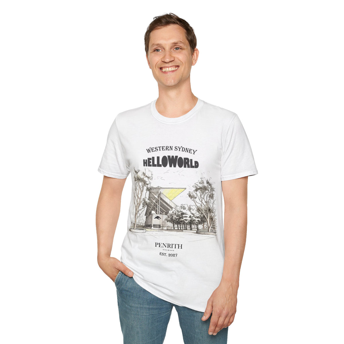 A man wearing a white graphic t-shirt with 'Western Sydney Helloworld Penrith' and a yellow triangle design, paired with blue jeans, against a plain white background.